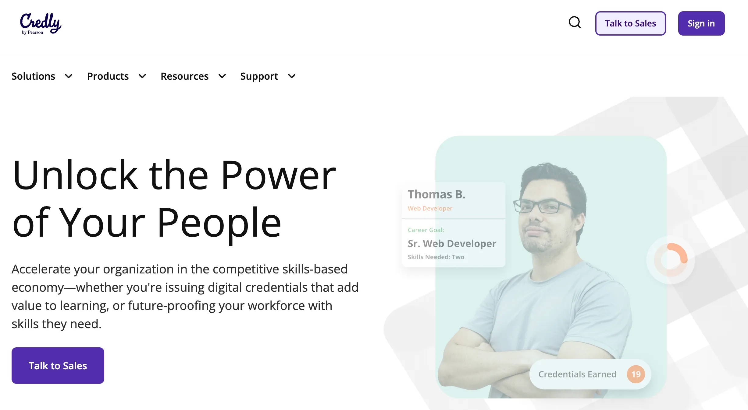 Credly by Pearson homepage headlined Unlock the Power of Your People, showing a credential holder profile